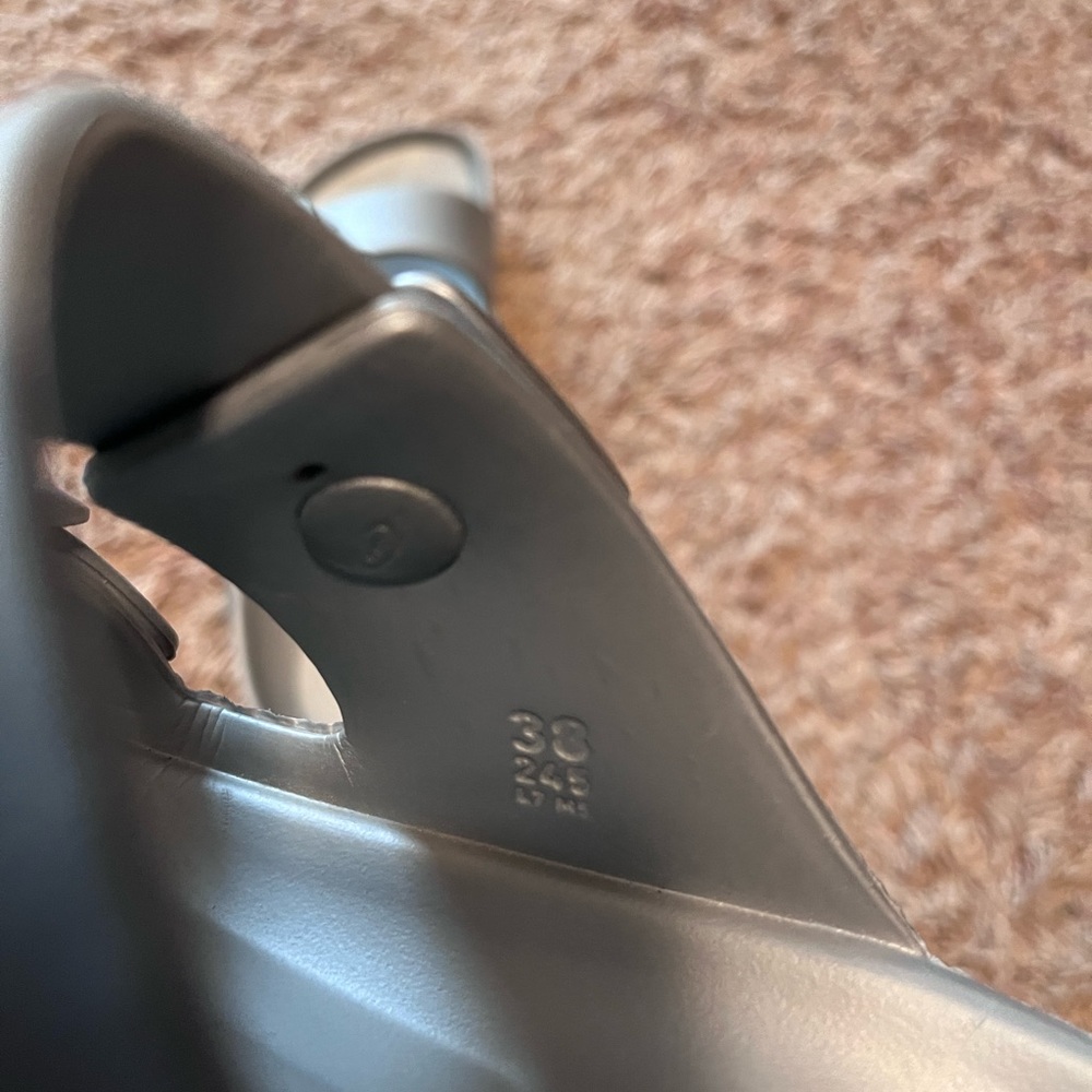 Size 7 Birkenstock sandals in a baby metallic blue have been worn before